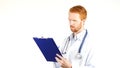 Doctor, surgeon Writing medical reports , white background Royalty Free Stock Photo