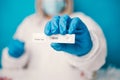 A laboratory employee taking sample PCR microtubes with cotton swab test. Diagnostic testing for COVID-19. The concept Royalty Free Stock Photo