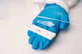 A laboratory employee taking sample PCR microtubes with cotton swab test. Diagnostic testing for COVID-19. The concept Royalty Free Stock Photo