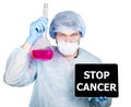 Doctor in surgical uniform, holding flask and digital tablet pc with stop cancer sign. technology, internet and Royalty Free Stock Photo
