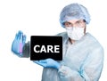 Doctor in surgical uniform, holding test tube and digital tablet pc with care sign. internet technology and networking Royalty Free Stock Photo