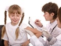 Doctor with syringe inject inoculation to child. Royalty Free Stock Photo