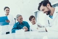 Doctor Taking Blood Sample from Boy`s Finger. Royalty Free Stock Photo