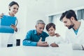 Doctor Taking Blood Sample from Boy`s Finger. Royalty Free Stock Photo