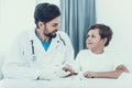 Doctor Taking Blood Sample from Boy`s Finger. Royalty Free Stock Photo