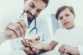 Doctor Taking Blood Sample from Boy`s Finger. Royalty Free Stock Photo