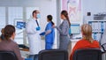 Doctor taking notes on clipboard about patient Royalty Free Stock Photo