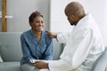 Doctor Talking With Elderly African Patient Royalty Free Stock Photo