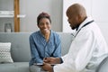 Doctor Talking With Elderly African Patient Royalty Free Stock Photo