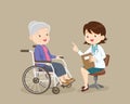 Doctor Talking With Elderly woman Patient in wheelchair Royalty Free Stock Photo