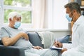 Doctor Talking To Elderly Patient Royalty Free Stock Photo