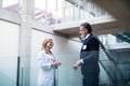Doctor talking to a pharmaceutical sales representative. Royalty Free Stock Photo