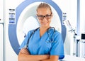 Doctor and tomographic scanner Royalty Free Stock Photo