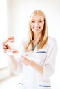 Doctor with toothbrush and jaws in hospital Royalty Free Stock Photo