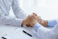 Doctor touches the arm to encourage the patient in the hospital examination room, treating the disease from a medical professional