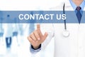 Doctor touching CONTACT US sign on virtual screen