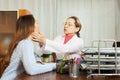 Doctor touching gizzard of girl Royalty Free Stock Photo