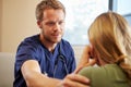 Doctor Treating Teenage Girl Suffering With Depression Royalty Free Stock Photo