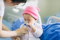 Doctor treatment a child who got sick by a chest infection after a cold or the flu that has trouble breathing and prolonged cough. Royalty Free Stock Photo