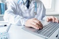 Doctor types, speaks, talks to patient by laptop. Telehealth,telemedicine,online consultation,video call conference.Medical Royalty Free Stock Photo