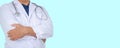 Doctor in uniform white coat standing and a stethoscope Isolated on blue background with a health care ,Copy space fore your text Royalty Free Stock Photo