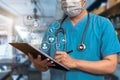 Doctor using clipboard and digital tablet find information patient medical history at the hospital. Royalty Free Stock Photo