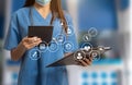 Doctor using clipboard and digital tablet find information patient medical history at the hospital. Medical technology concept Royalty Free Stock Photo