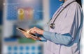 Doctor using digital tablet find information patient medical history at the hospital. Royalty Free Stock Photo