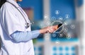 Doctor using digital tablet find information patient medical history at the hospital. Royalty Free Stock Photo