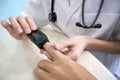 Doctor using pulse oximeter to check oxygen of a person