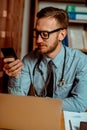 Doctor using smartphone Royalty Free Stock Photo