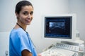 Doctor using sonography machine in hospital