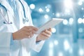 Doctor using tablet with digital network connections in modern medical technology concept Royalty Free Stock Photo