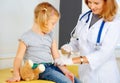 Doctor vaccinating small girl Royalty Free Stock Photo