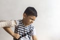 A doctor vaccinating young patient. Little boy scared of injection