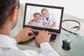 Doctor video chatting with nurse and patient Royalty Free Stock Photo