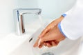 Doctor Washes Hands Before Medical Work. Dental Clinic