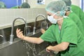 Doctor Washing Hands Before Surgery