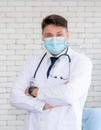 Doctor wear face mask in hospital protect from coronavirus disease or COVID-19. Royalty Free Stock Photo