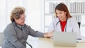 Doctor wearing and hold stethoscope on asian senior elderly woman for listening to internal sounds of patient body in examination