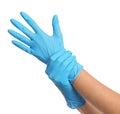 Doctor wearing medical gloves on white background, closeup Royalty Free Stock Photo