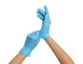Doctor wearing medical gloves on white background, closeup Royalty Free Stock Photo
