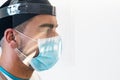 Doctor wearing ppe face surgical mask and visor fighting against corona virus outbreak