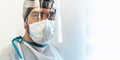 Doctor wearing ppe face surgical mask and visor fighting against corona virus outbreak