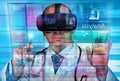 Doctor wearing virtual reality glasses working with software medical