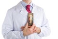 Doctor in white coat holding Merciful Jesus icon