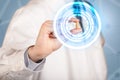 doctor in white coat showing a glowing pill in blue, white circles