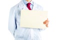 Doctor in white coat showing a yellow signboard