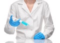 Doctor in white gown and gloves holding syringe with drug Royalty Free Stock Photo