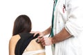 Doctor with white uniform do back auscultation with stethoscope. horizontal cut. Caucasian.